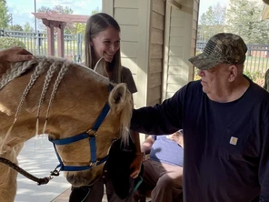 Staff with horse and resident